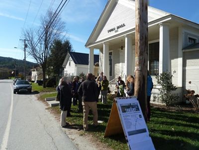 gathering of citizens outside town hall