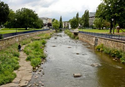 view of urban river greenway